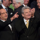 François Hollande points inside the Berlin Philharmonic. Next to him is German President Joachim Gauck.